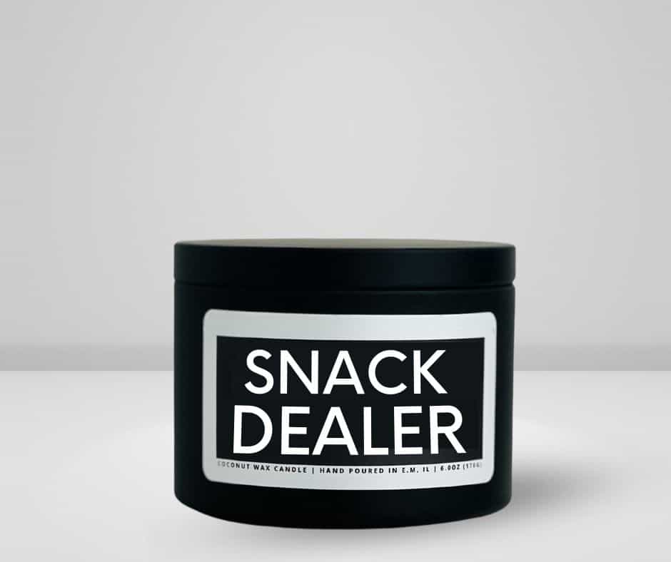 6 oz MATTE BLACK TIN candle made by She Said Candle Co labeled Snack Dealer