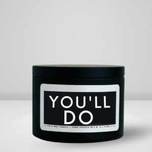 6oz matte black tin candle made by She Said Candle co labeled You'll do