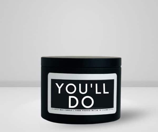 6oz matte black tin candle made by She Said Candle co labeled You'll do