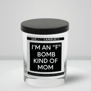 10oz clear candle jar made by She Said Candle Co labeled "I'm an F bomb kind of mom"