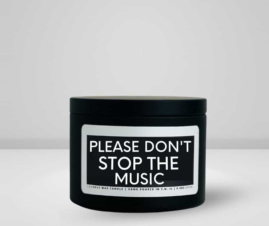 6oz matte black candle tin made by She Said Candle Co labeled Please Don't Stop The Music