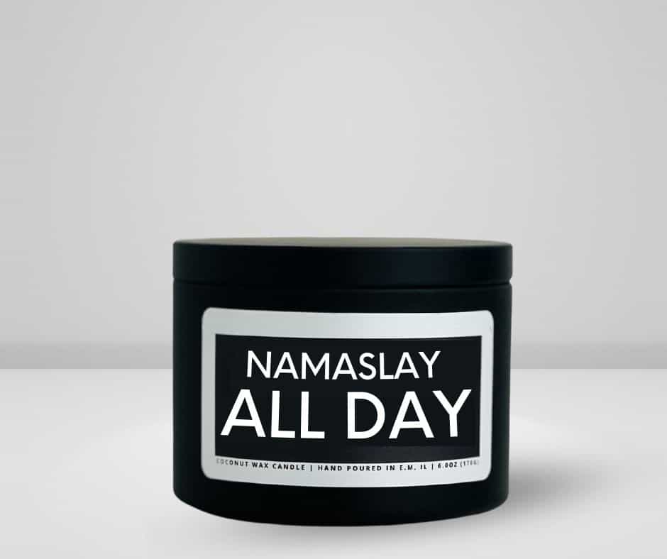 6oz matte black tin candle made by She Said Candle Co labeled Namaslay All Day