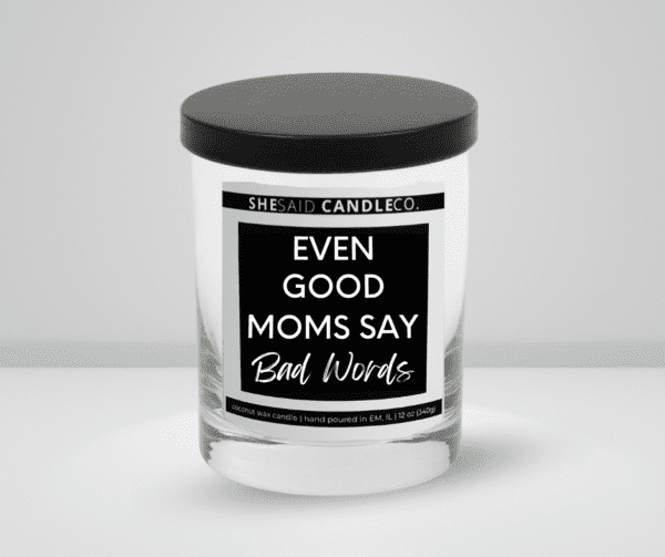 clear jar 10 oz coconut wax candle labeled even good moms say bad words made by she said candle co.